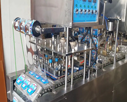 cups filling and sealing machine