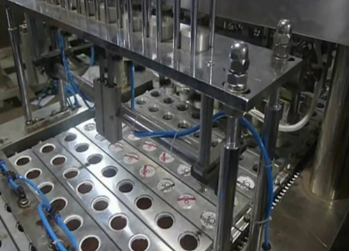 coffee capsule filling and sealing machine